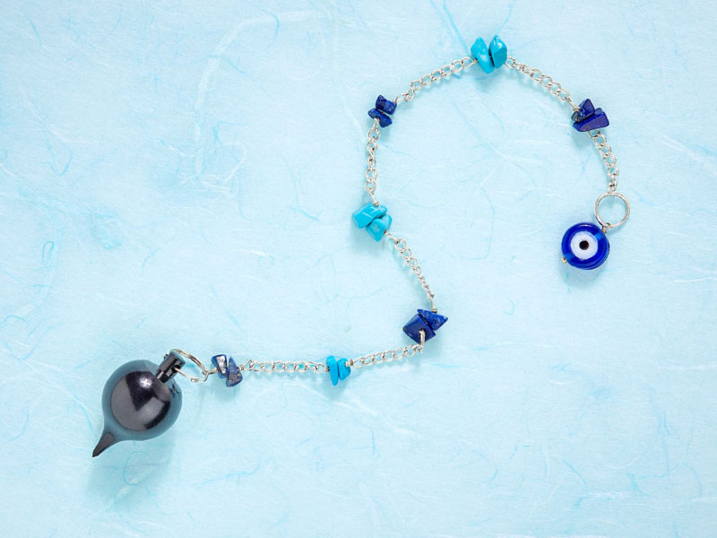 Pendel mit gläsernem Auge, Türkis und Lapislazuli