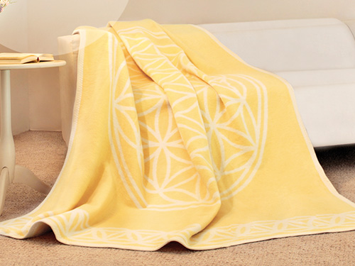 Produkt: Gelbe Decke mit dem Symbol der Blume des Lebens